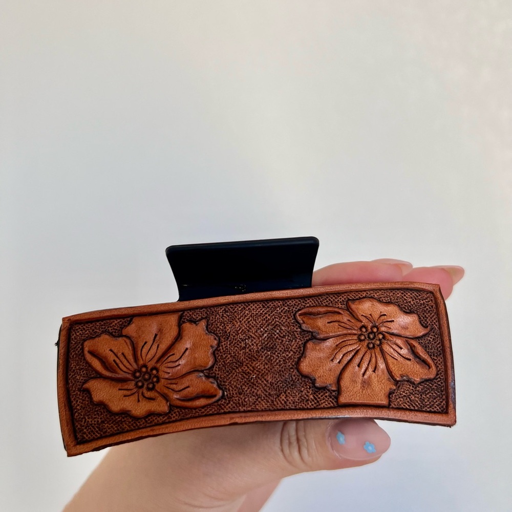 Hand tooled leather hair clip. Genuine leather and nice for thick hair